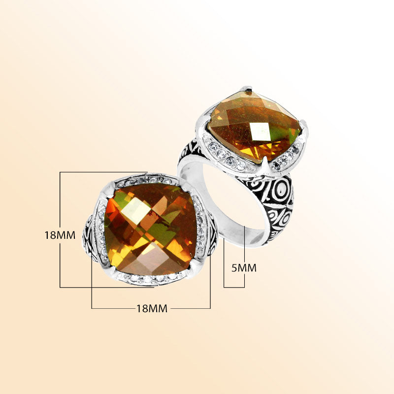 Handmade sterling silver Balinese ring with cushion-cut Citrine Quartz in warm golden tones.