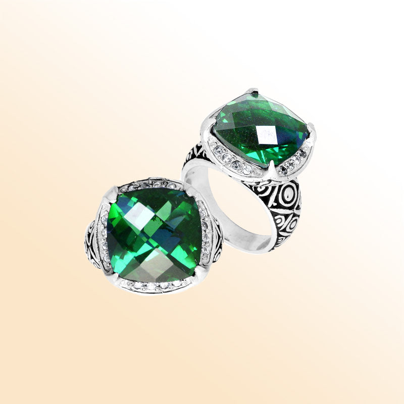 Handmade sterling silver Balinese ring with cushion-cut Green Quartz in vibrant tones.
