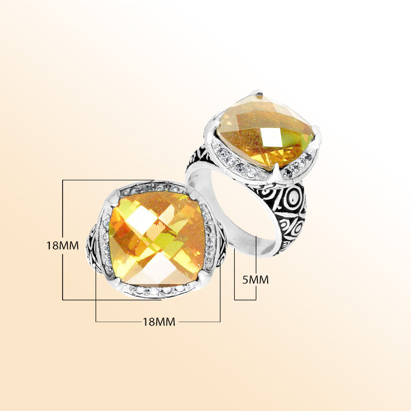 Handmade sterling silver Balinese ring with cushion-cut Lemon Quartz in a detailed setting.