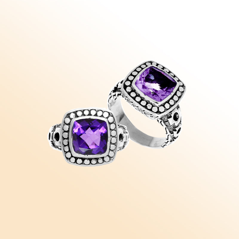 Handmade sterling silver Balinese ring with cushion-cut Amethyst Quartz in a dotted bezel design.