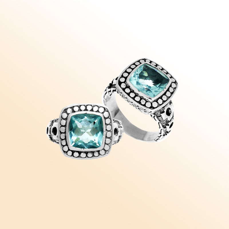Handmade sterling silver Balinese ring with cushion-cut Blue Topaz Quartz in a dotted bezel.
