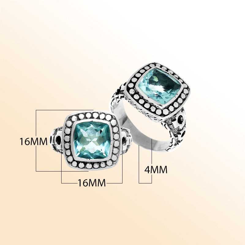 Handmade sterling silver Balinese ring with cushion-cut Blue Topaz Quartz in a dotted bezel.