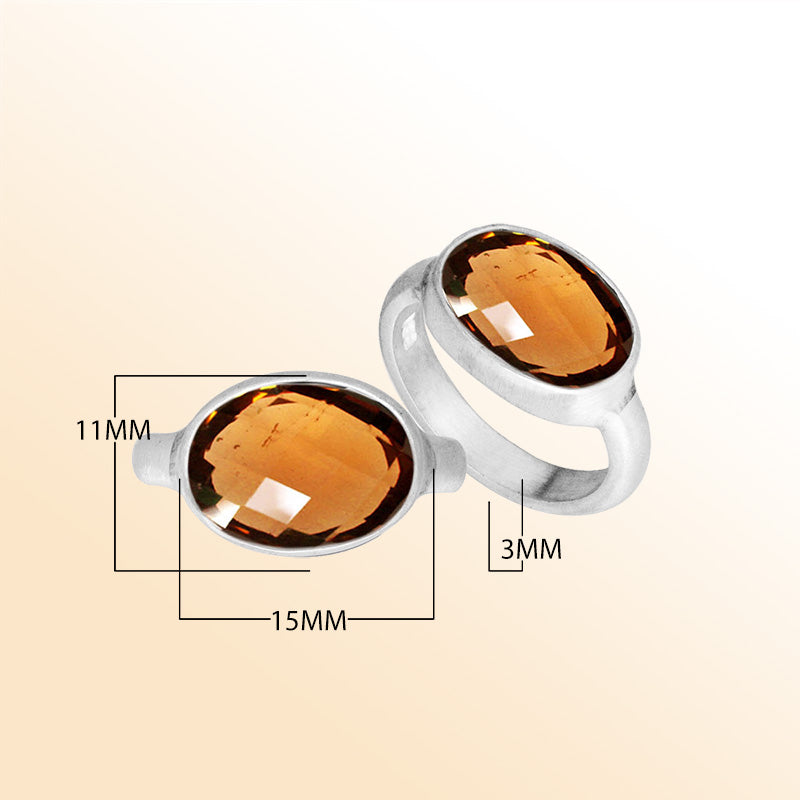 Handmade Sterling Silver ring with twin oval Citrine Quartz stones, polished Bali artisan design.