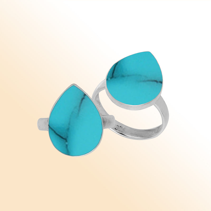Handcrafted Sterling Silver pear shape ring with Turquoise Shell and polished Balinese detailing