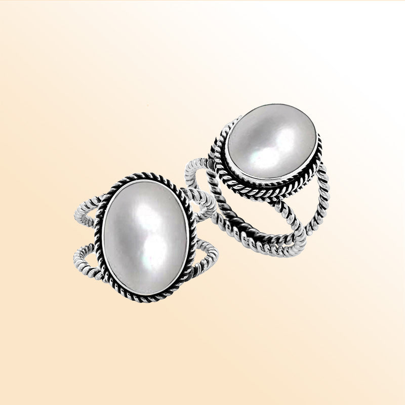 Handcrafted Sterling Silver oval shape ring with White Mother of Pearl and twisted Bali rope design