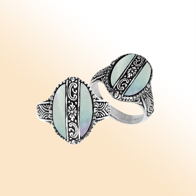 Sterling Silver Mother Of Pearl Oval Shape Statement Ring With Balinese Artistic Design
