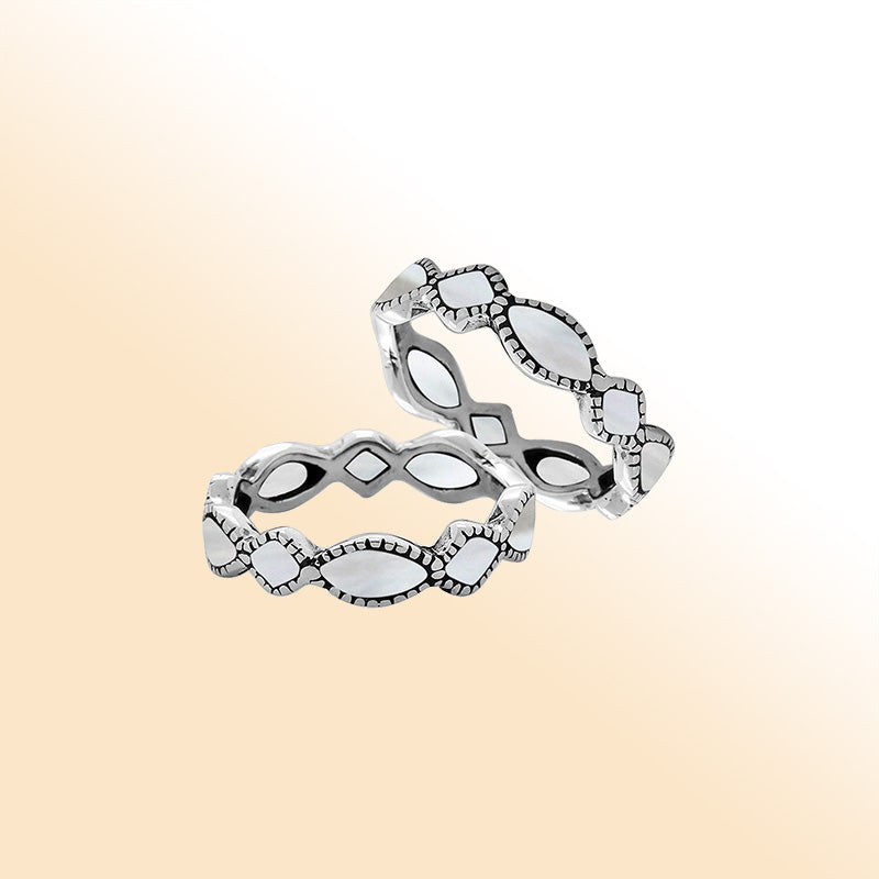 Elegant sterling silver Mother Of Pearl wave band ring with Balinese handcrafted detailing