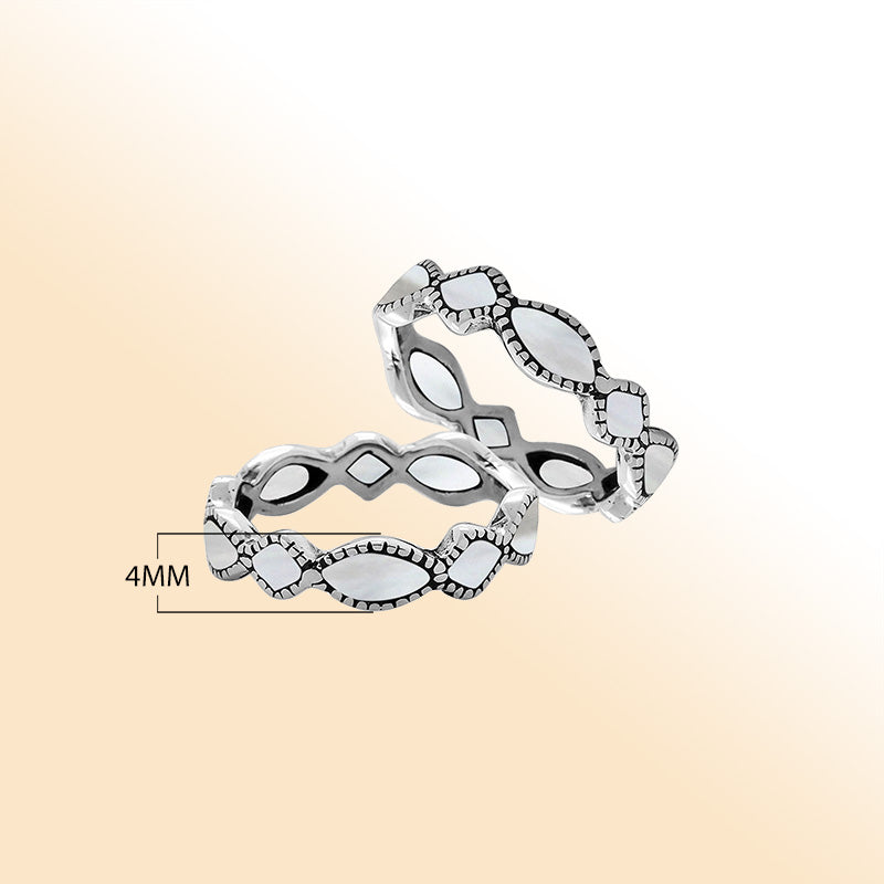 Elegant sterling silver Mother Of Pearl wave band ring with Balinese handcrafted detailing