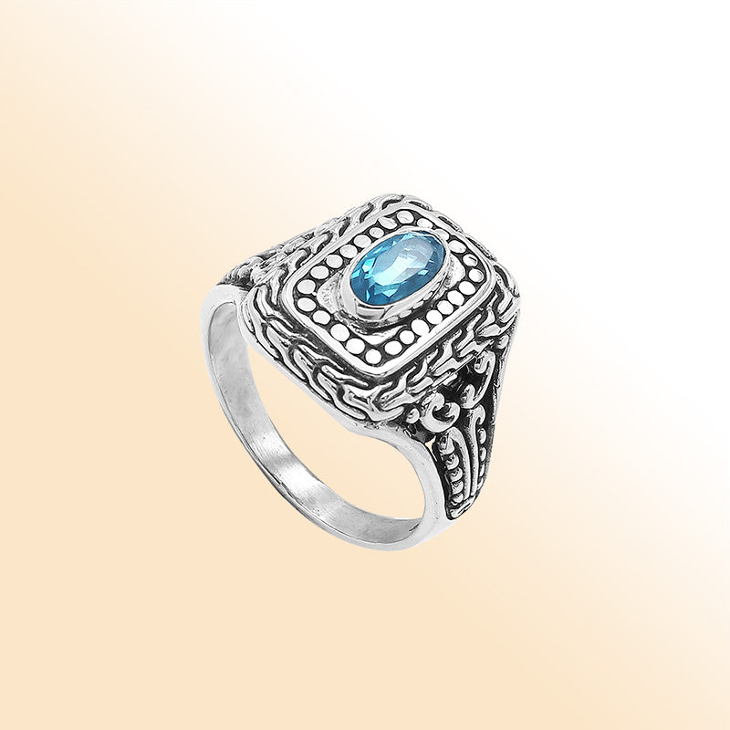 Sterling Silver Balinese Handcrafted Ring With Blue Topaz Quartz In Rectangular Designer Setting