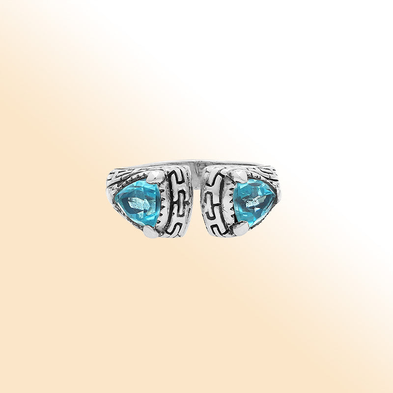 Elegant Sterling Silver Open Blue Topaz Quartz Ring With Balinese Design
