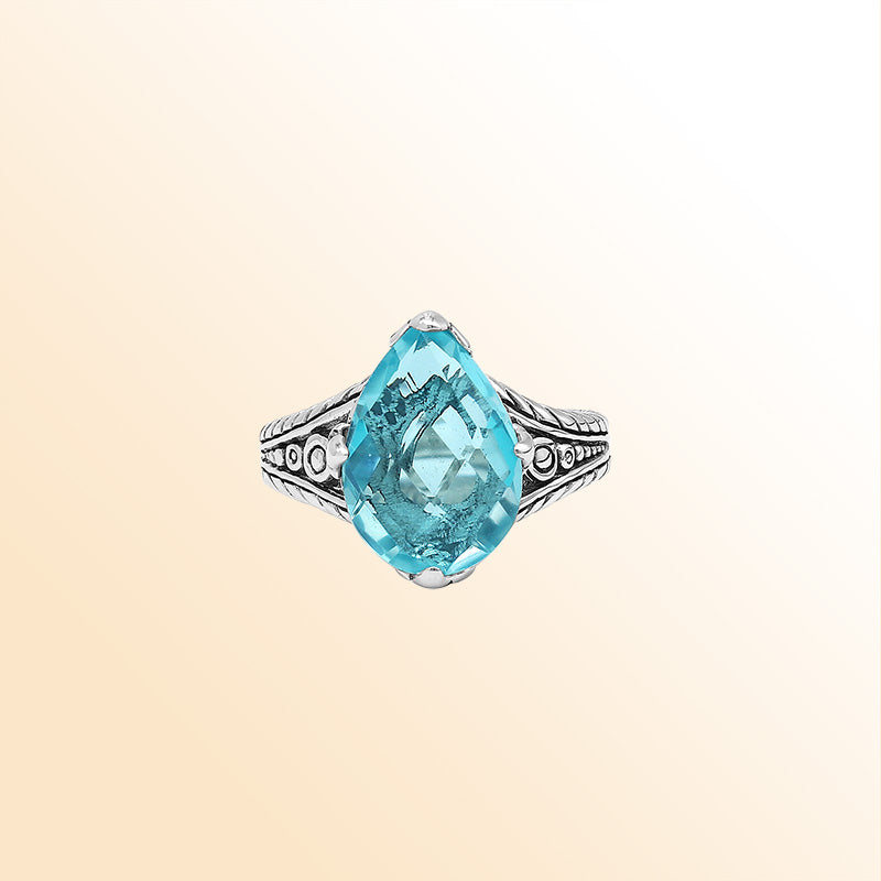 Handcrafted Sterling Silver Blue Topaz Quartz Teardrop Royal Elegance Heritage Ring With Balinese Detailing.