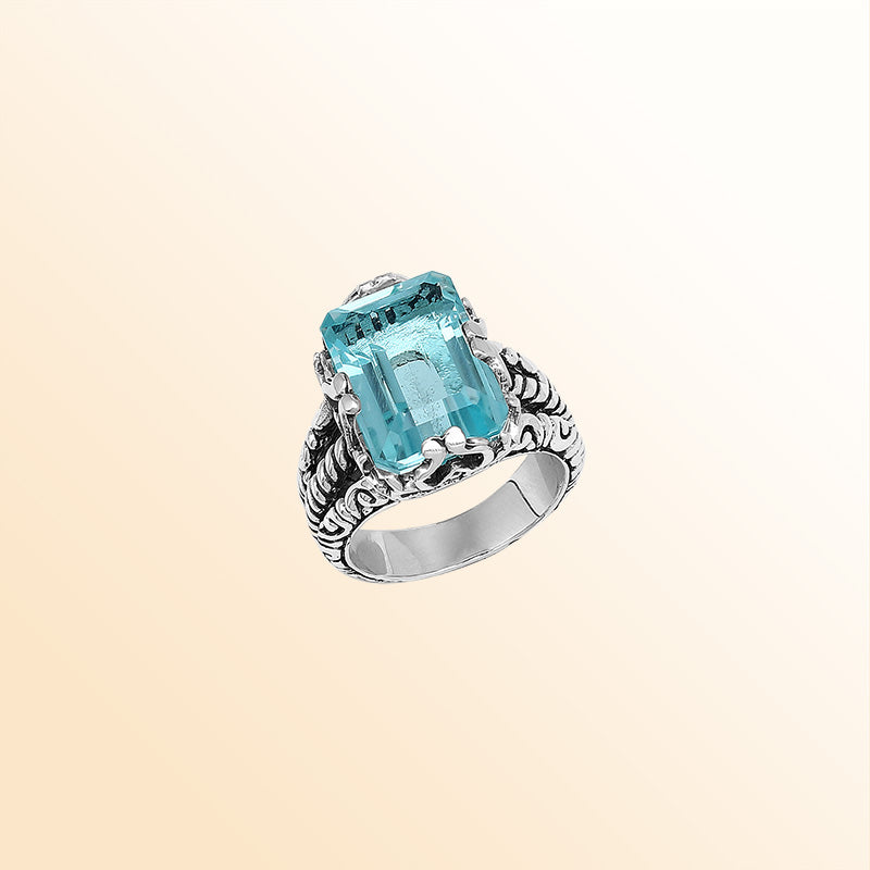 Handcrafted Sterling Silver Blue Topaz Quartz Ocean Radiance Rope Elegance Ring With Balinese Detailing.