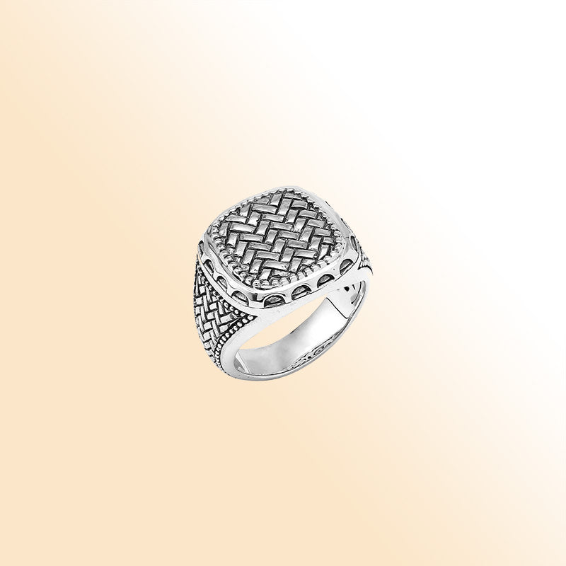 Men’s sterling silver ring with woven texture and oxidized finish, handcrafted Bali artisan jewelry statement design.