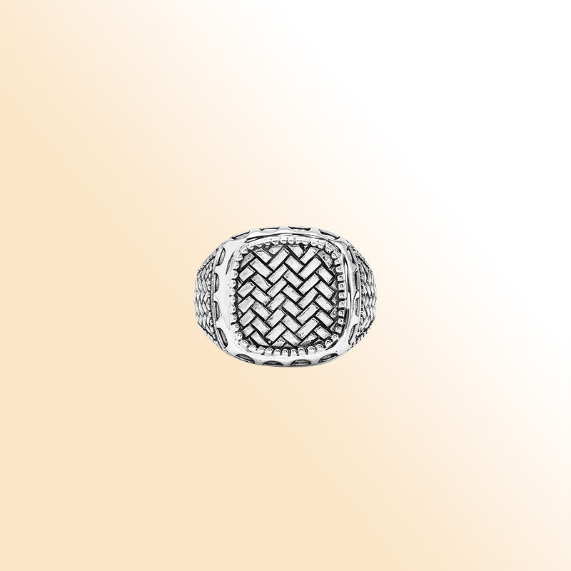 Men’s sterling silver ring with woven texture and oxidized finish, handcrafted Bali artisan jewelry statement design.