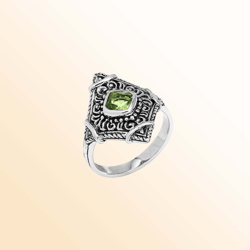 Handcrafted sterling silver Peridot Quartz ring with decorative Balinese filigree accents
