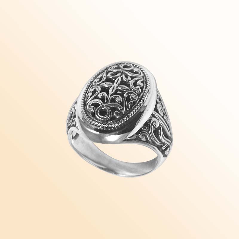 Silver Overlay Over Copper Oval Carved Balinese Ring With Artistic Swirl Engravings.