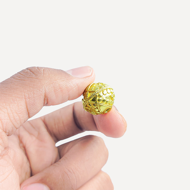 Handcrafted India round bead with 18K gold overlay over copper featuring textured detailing