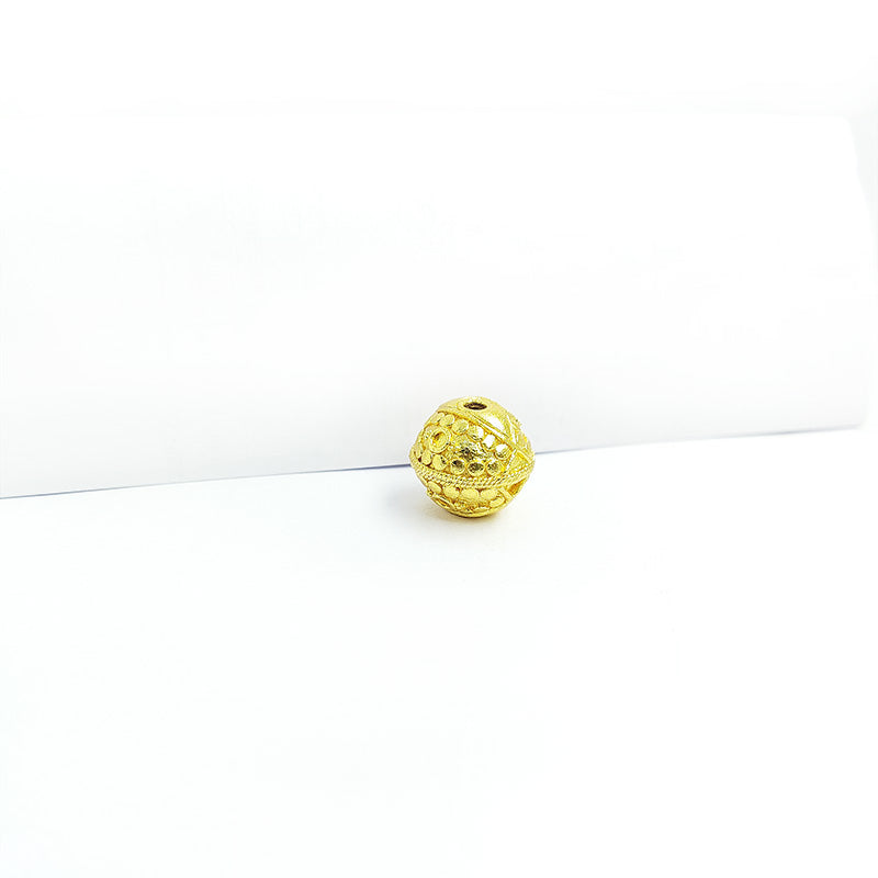 Handcrafted India round bead with 18K gold overlay over copper featuring textured detailing