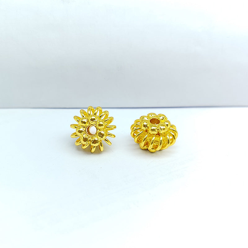 Handcrafted 18K gold overlay floral bead with copper core, artisan-made in India.