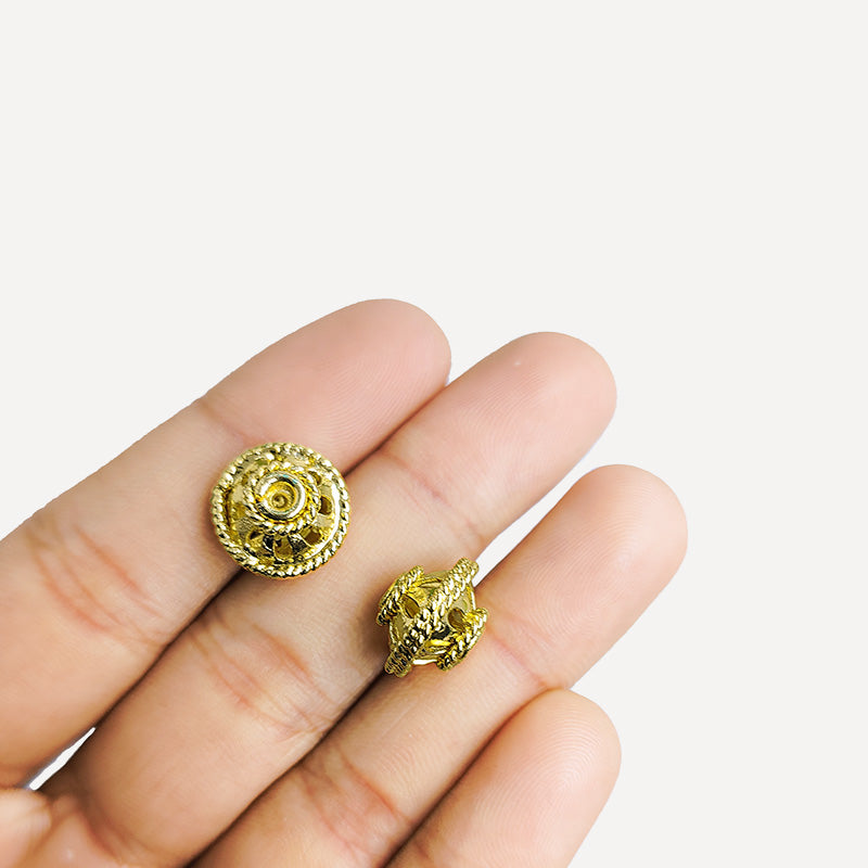 Handcrafted 18K gold overlay copper filigree dome bead from India with openwork design for jewelry making.