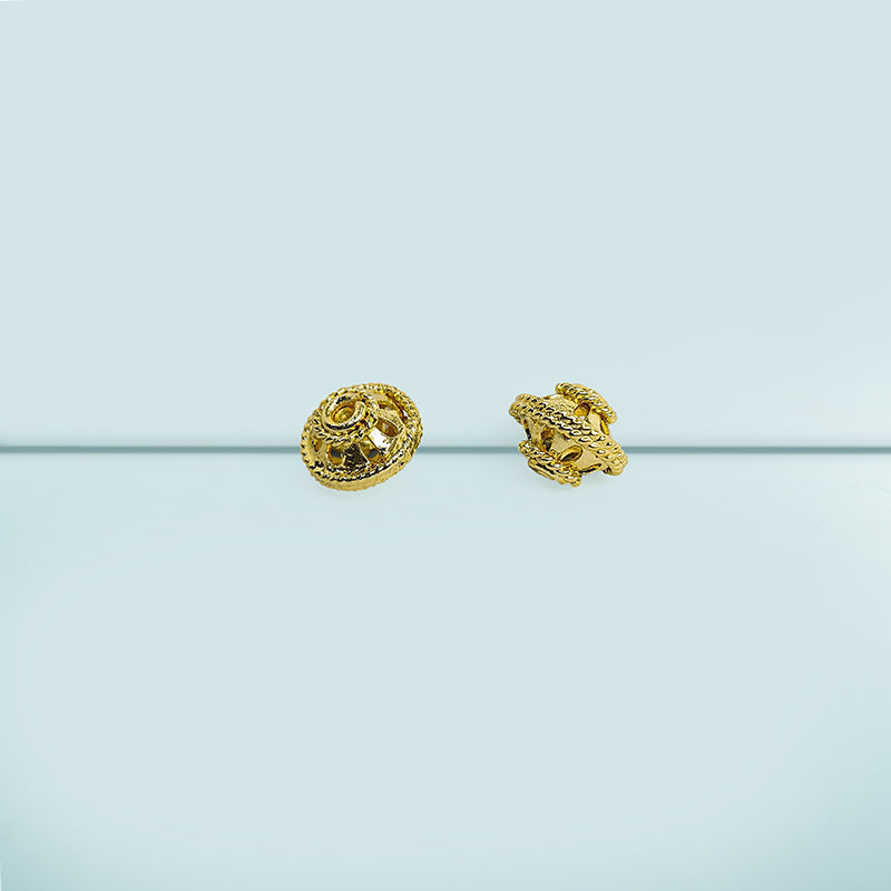 Handcrafted 18K gold overlay copper filigree dome bead from India with openwork design for jewelry making.