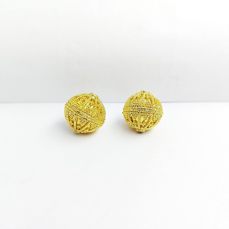 Handcrafted 18K gold overlay copper bead with rope-textured and granulated design from India for jewelry making.