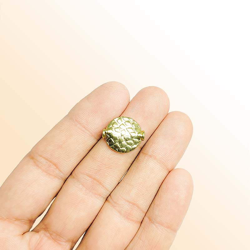 Handcrafted 18K gold overlay flat disc copper bead with hammered texture from India for jewelry making.