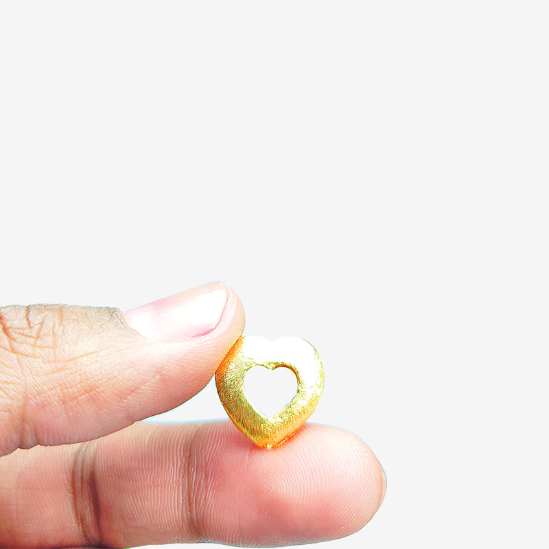 Handcrafted 18K gold overlay copper heart-shaped textured connector from India for jewelry making.