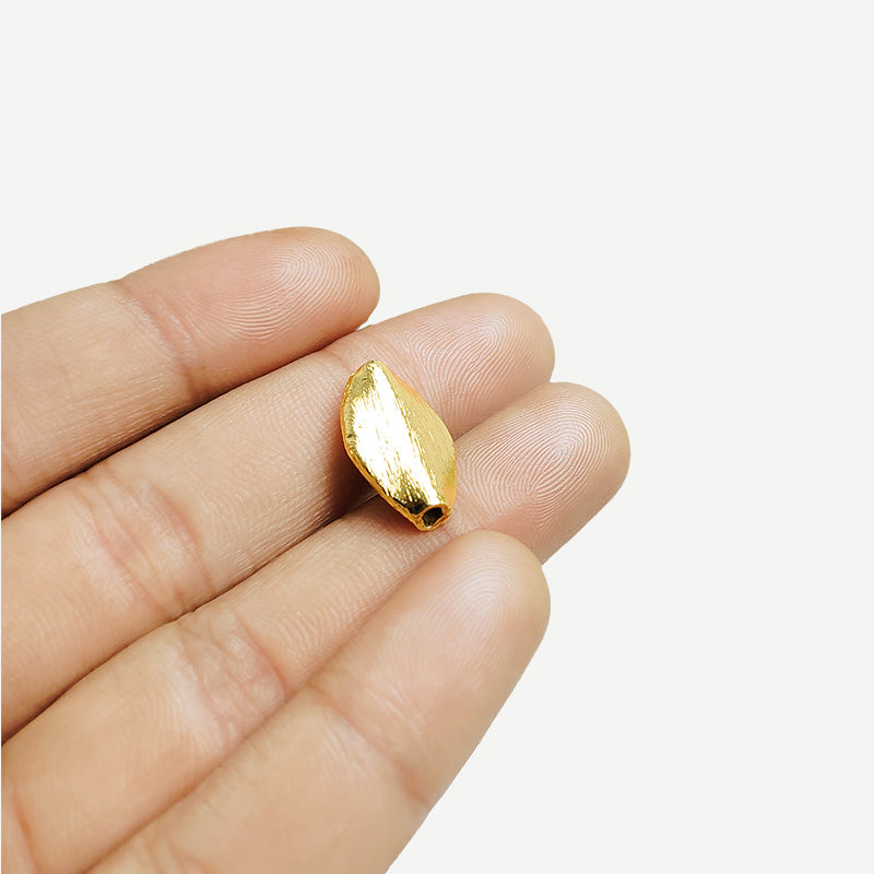 Handcrafted 18K gold overlay brushed oval copper bead from India for jewelry making.