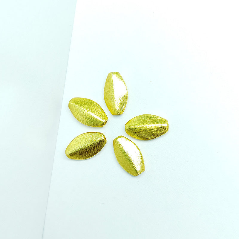 Handcrafted 18K gold overlay brushed oval copper bead from India for jewelry making.