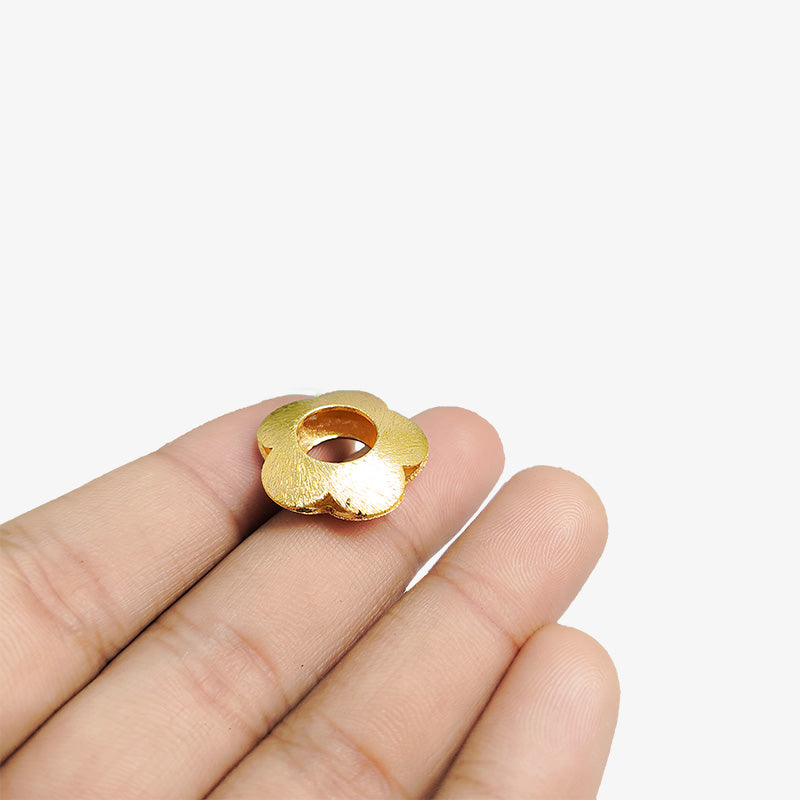 Handcrafted 18K gold overlay copper flower connector with brushed texture from India for jewelry making.