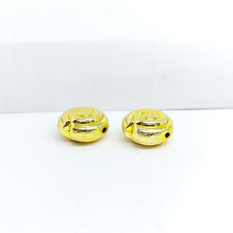 Handcrafted 18K gold overlay copper coin bead with brushed spiral design from India for jewelry making.