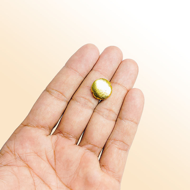 Handcrafted 18K gold overlay brushed coin-shaped copper bead with notch design from India.