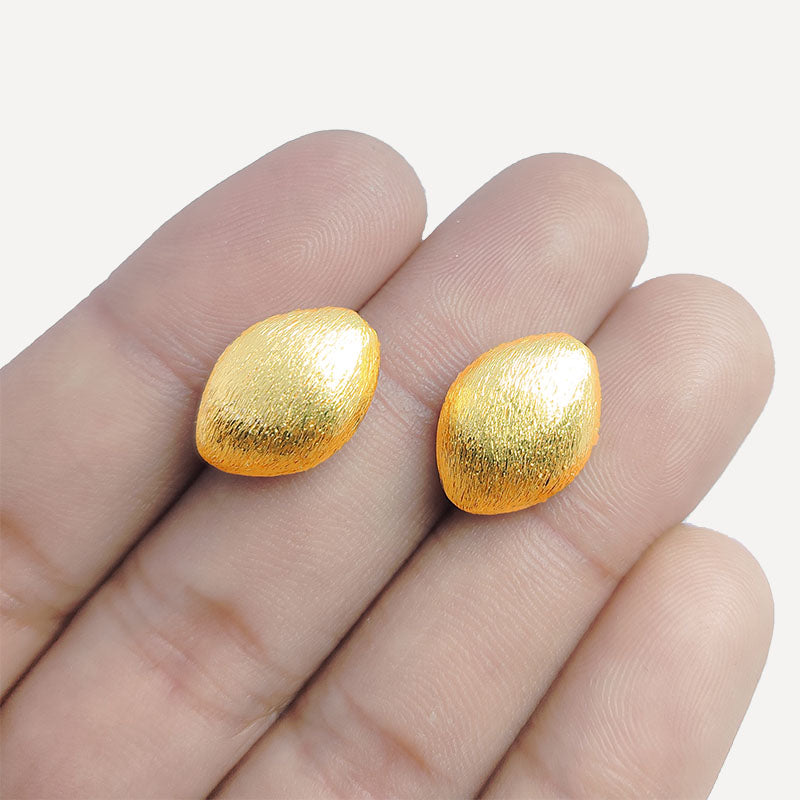 Handcrafted 18K gold overlay brushed oval barrel bead made from copper in India.
