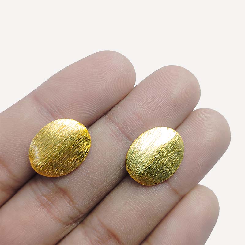 Handcrafted brushed flat oval bead made from copper with 18K gold overlay, crafted in India.