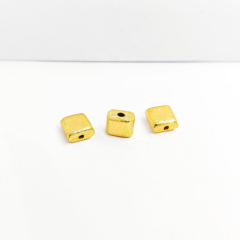 Handcrafted brushed square bead made of copper with 18K gold overlay, crafted in India for jewelry making.