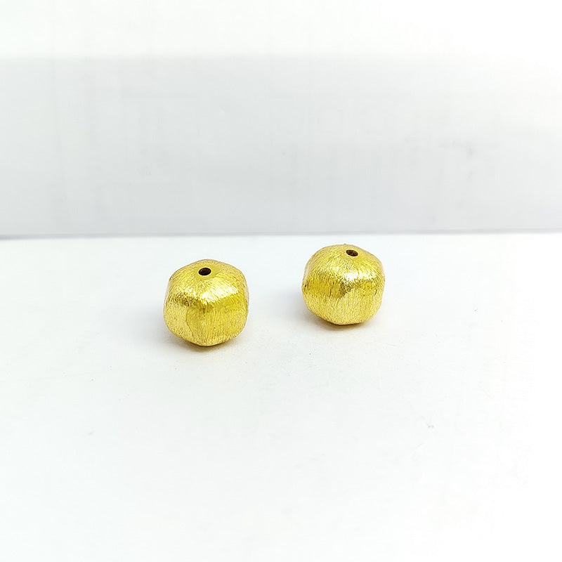 Handcrafted hexagon copper bead with 18K gold overlay and brushed finish, made in India.