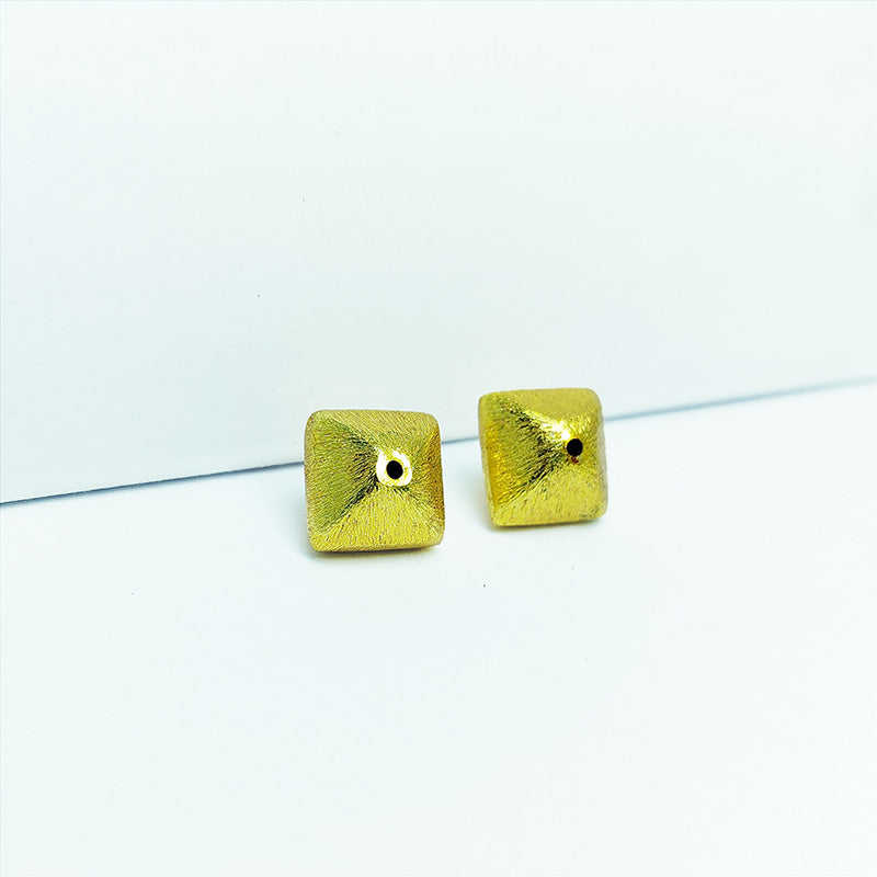 Handcrafted square domed bead with brushed 18K gold overlay, perfect for DIY jewelry designs.