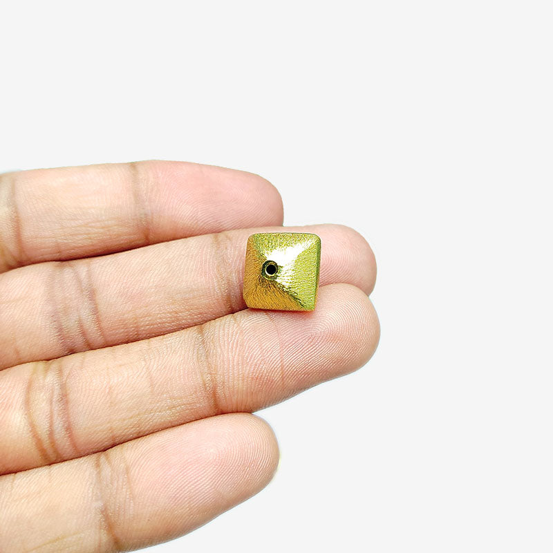 Handcrafted square domed bead with brushed 18K gold overlay, perfect for DIY jewelry designs.