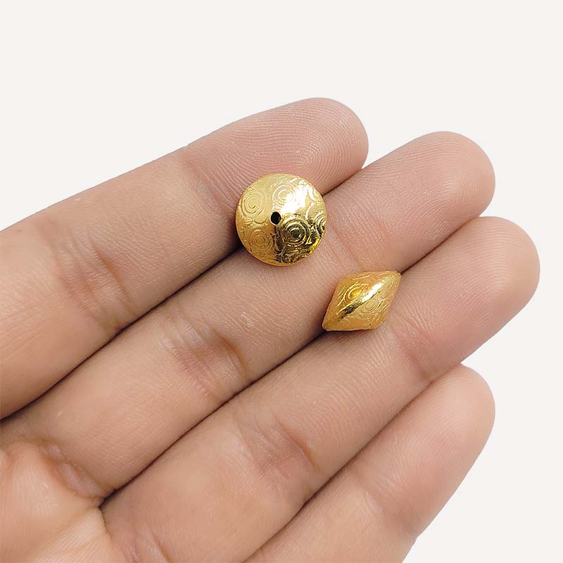 Elegant handcrafted round bead made from 18K Gold Overlay Over Copper in India with engraved circular detailing.