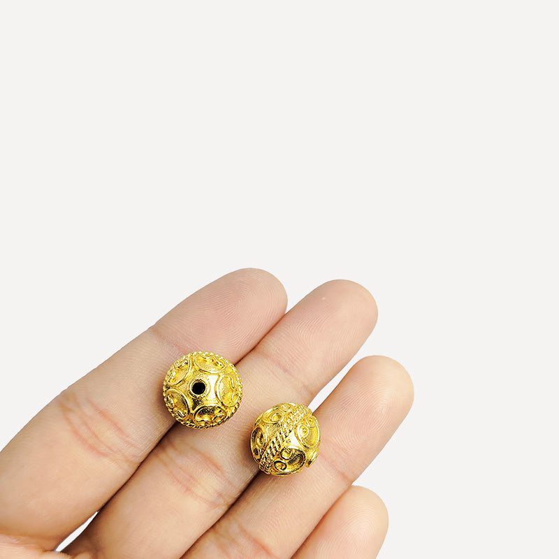 Elegant handcrafted openwork round bead made from 18K Gold Overlay Over Copper in India with raised circular detailing.