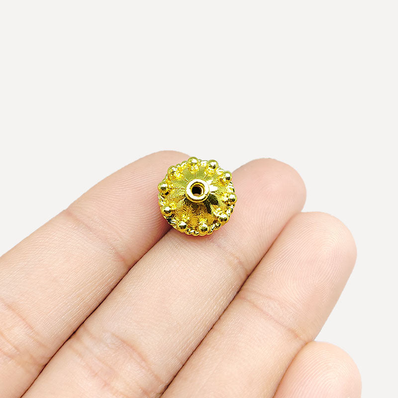 Elegant handcrafted floral domed round bead made from 18K Gold Overlay Over Copper in India with raised petal detailing.