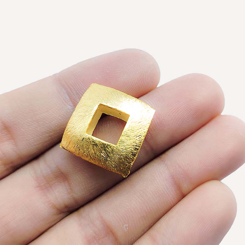 Modern square frame jewelry accent with 18K gold overlay over copper handcrafted in India