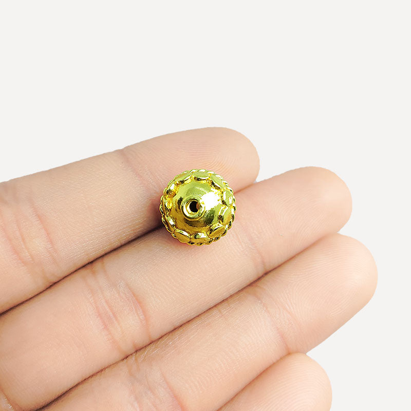 Floral round jewelry bead with 18K gold overlay over copper handcrafted in India