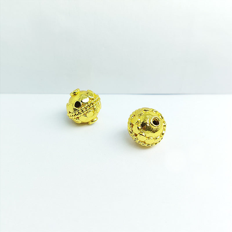Floral round jewelry bead with 18K gold overlay over copper handcrafted in India