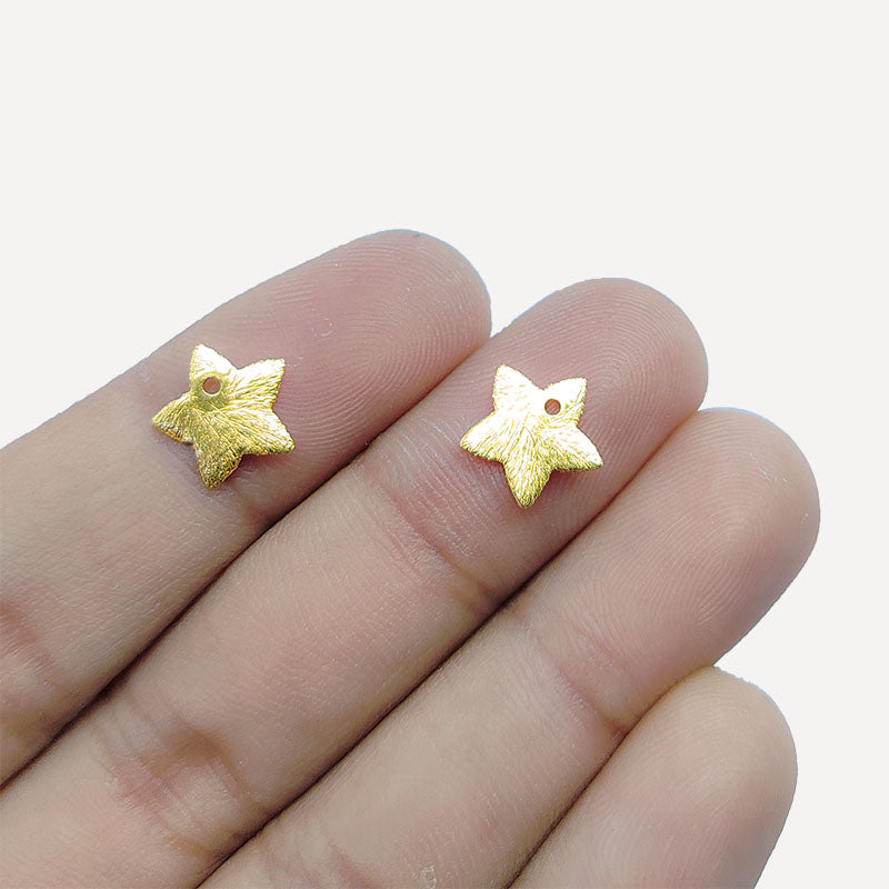 Star shape jewelry charm with 18K gold overlay over copper handcrafted in India