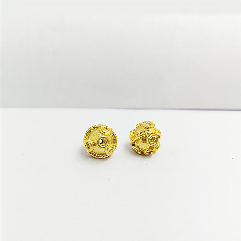 Raised ring round jewelry bead with 18K gold overlay over copper handcrafted in India