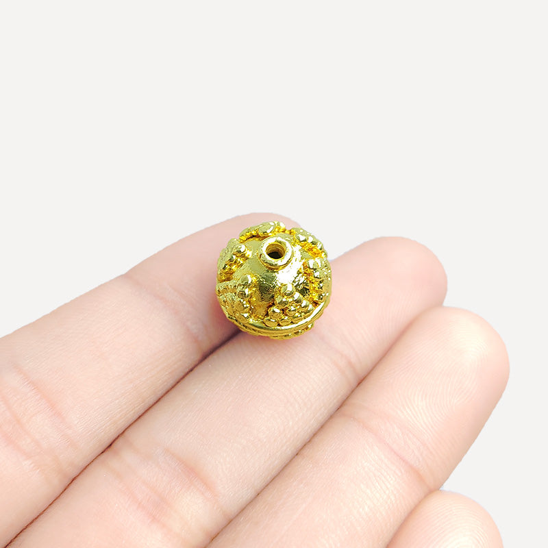 Floral textured round jewelry bead with 18K gold overlay over copper handcrafted in India