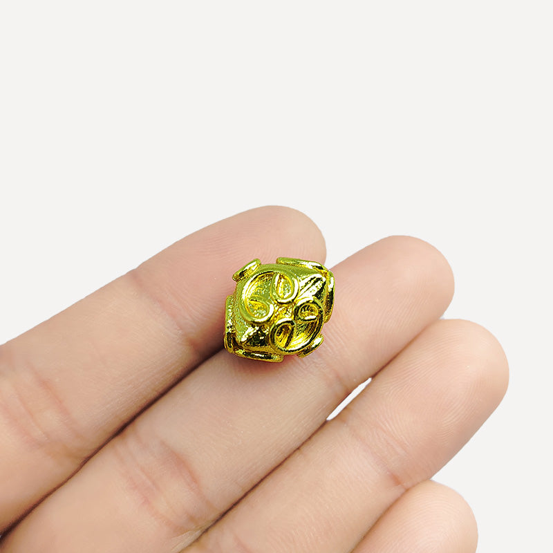 Elegant geometric bead with 18K gold overlay over copper, handcrafted in India, ideal for DIY and handmade jewelry designs.