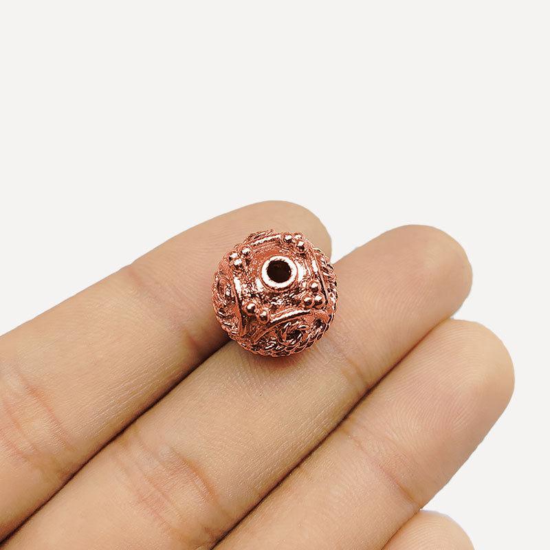 Ornate rose gold overlay copper bead handcrafted in India for retail jewelry making